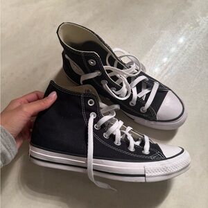 Black and white high top converse